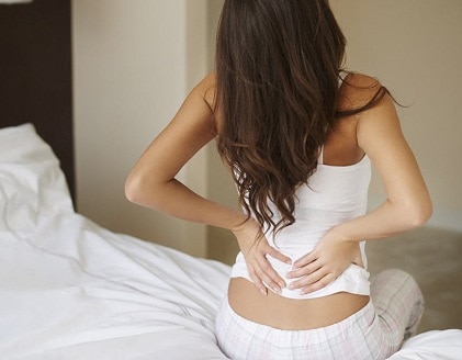 Ngủ dậy bị đau lưng là bệnh gì?